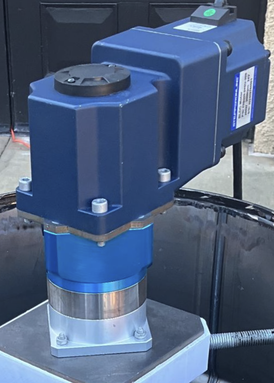 24V BLDC motor with planetary gearbox mounted on the redesigned motor mount inside the drum